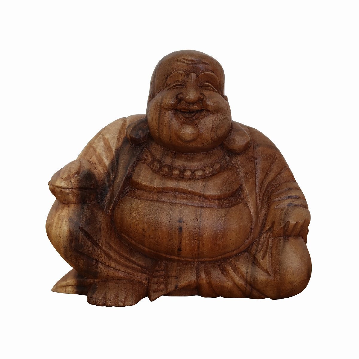 Small carved wooden figurine of a smiling seated character in warm brown tones on a plain white background, cheerful mood